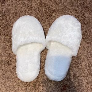 White fuzzy slippers
